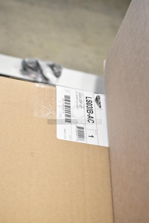 Box of 5 new Vollrath LS03IB-AC LidSaver™ 3 in-counter lid dispensers. Visible label with model and barcode.