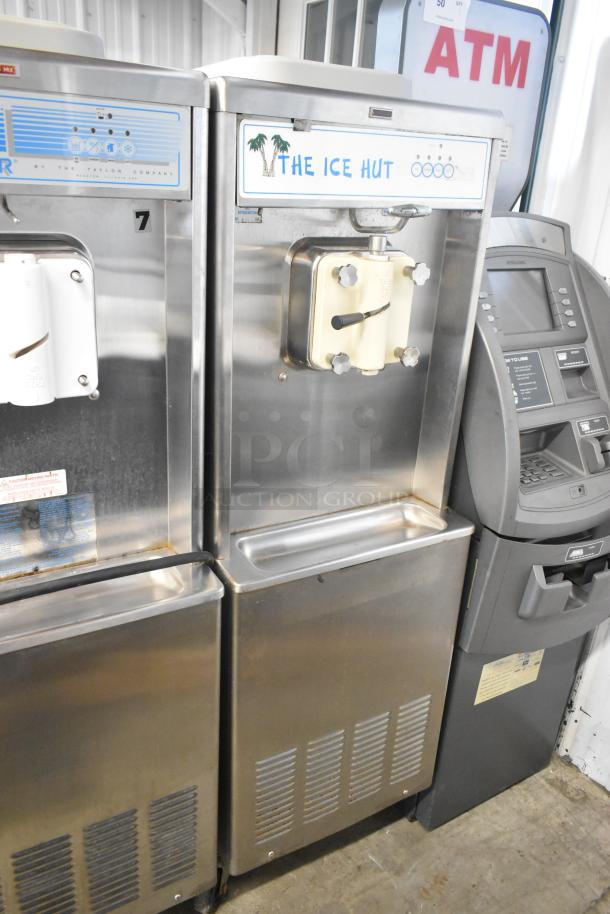 Taylor 441-33 stainless steel floor style soft serve machine, single flavor, water-cooled, on commercial casters.