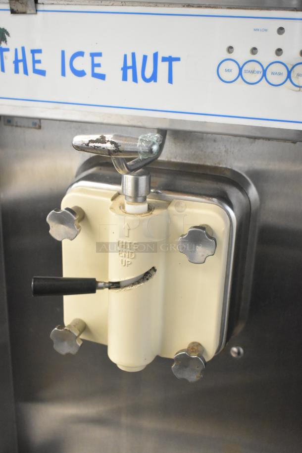Taylor 441-33 stainless steel soft serve ice cream machine with control panel. Features single flavor dispenser.