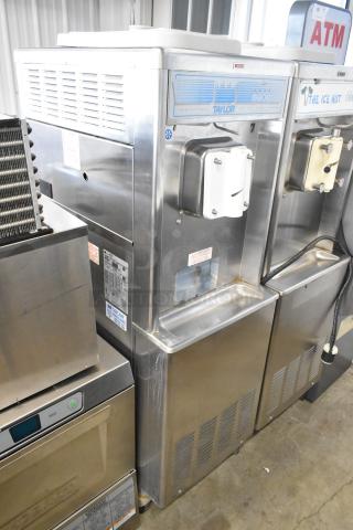 Taylor 441-33 stainless steel soft serve machine, single flavor, water-cooled, on casters, 208-230V, 1 phase.