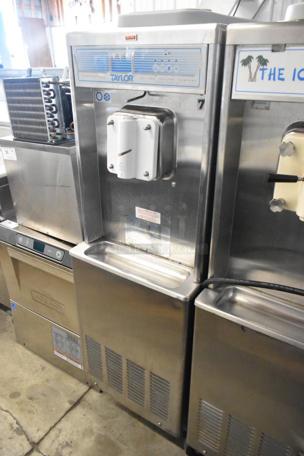 Taylor 441-33 stainless steel soft serve ice cream machine, single flavor, water-cooled, on casters, 208-230V, 1 phase.