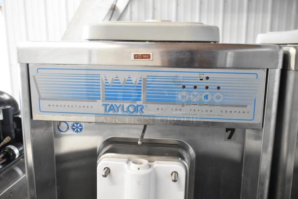 Taylor 441-33 stainless steel commercial soft serve ice cream machine, water-cooled, floor style, on casters, 208-230V.