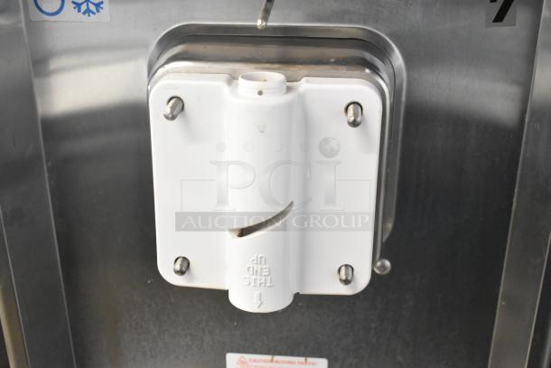 Taylor 441-33 stainless steel soft serve ice cream machine, water-cooled, single flavor, on commercial casters.