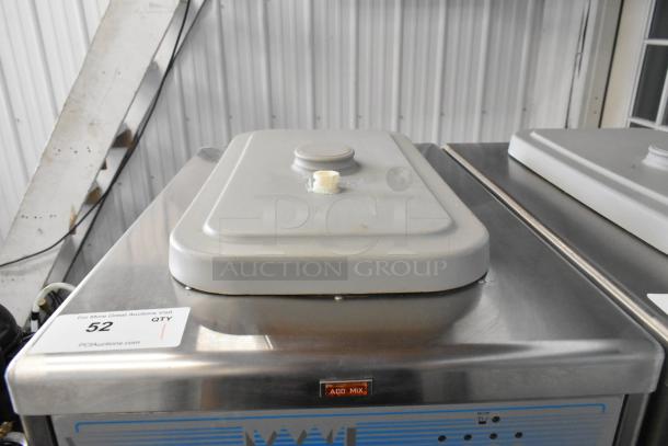 Taylor 441-33 stainless steel soft serve ice cream machine, single flavor, water cooled, on casters, 208-230V, 1 phase.