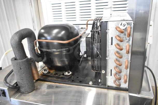Micro Matic MMPP4301 stainless steel glycol chiller, 115V, 1 phase. Features visible coils and compressor, used condition.