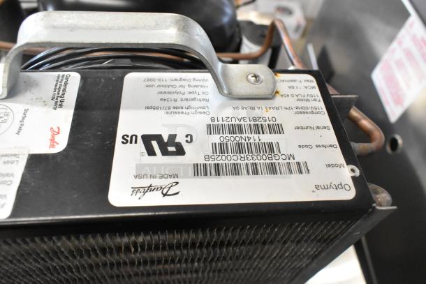 Micro Matic MMPP4301 stainless steel glycol chiller, 115 volts, 1 phase. Visible label showing model and technical details.