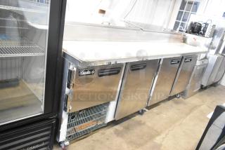 2021 Leader ESPT96 stainless steel pizza prep table with marble pattern cutting board, commercial casters, 115V, 1 phase.