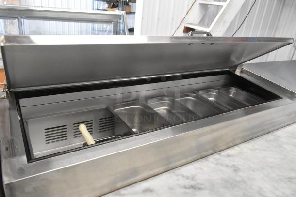 2021 Leader ESPT96 stainless steel pizza prep table with marble pattern cutting board, commercial casters, 115V, 1 phase.