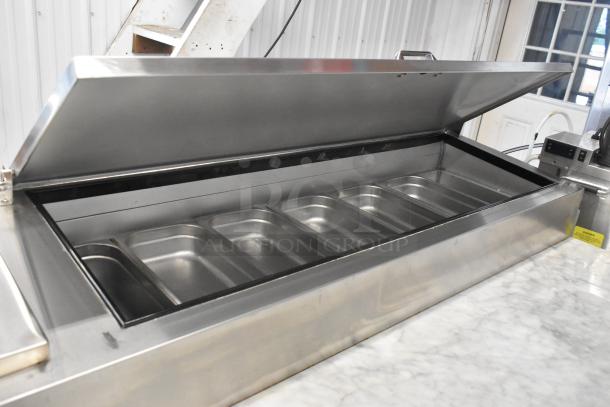 2021 Leader ESPT96 stainless steel commercial pizza prep table with marble-pattern cutting board and casters. 115V, 1 phase.