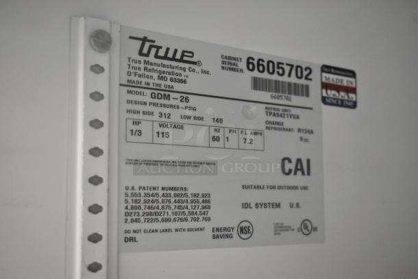True GDM-26 cooler label, showing model, voltage (115V), phase (1), and refrigerant details. Made in USA.