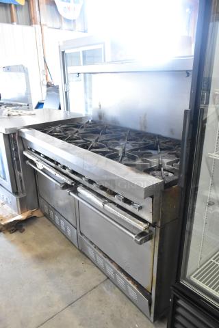 Garland SunFire stainless steel commercial gas range, 10 burners, 2 ovens, over shelf, back splash, used condition.