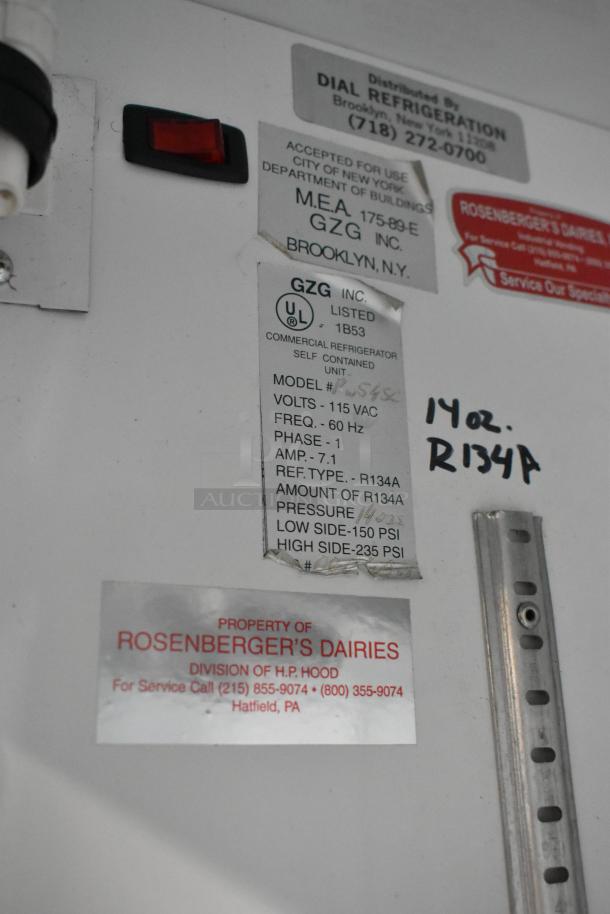 R-54SC Metal Commercial 2 Door Reach-In Cooler, 115 Volts, 1 Phase. Tags show model, voltage, and service info.