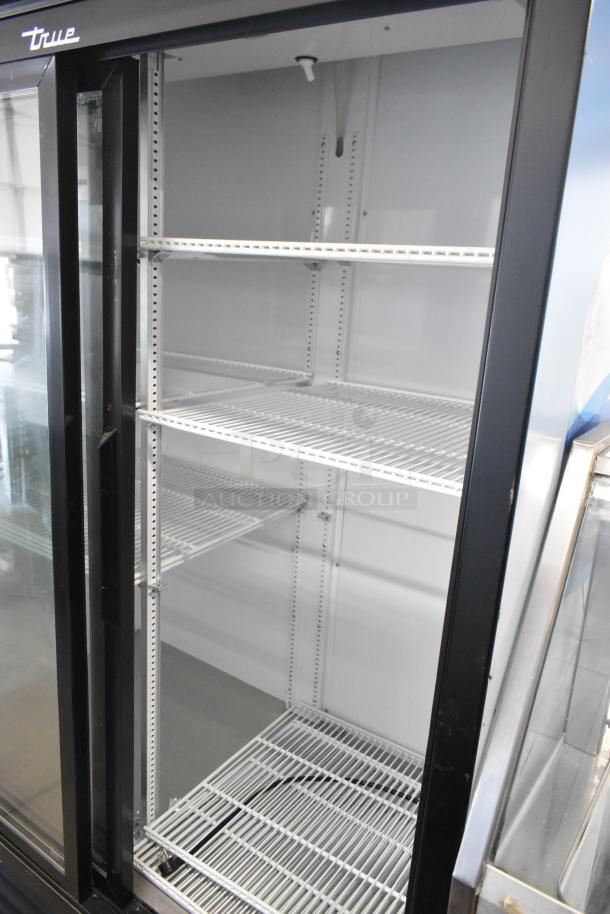 2018 True GDM-45-HC-LD commercial 2-door cooler, metal, poly-coated racks, 115V, 1 phase, clean condition.