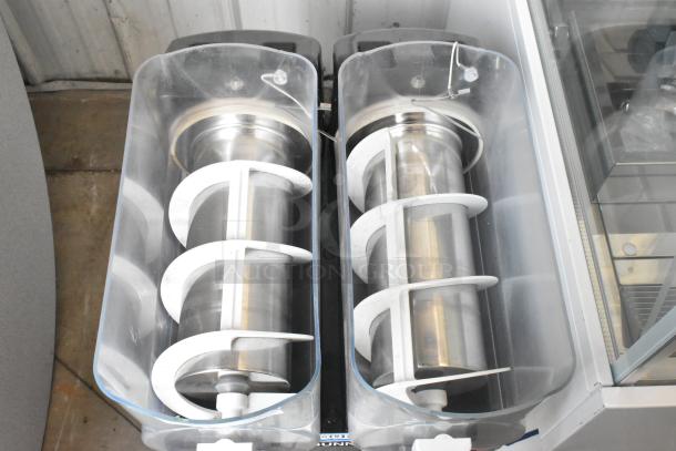 Bunn ULTRA-2 stainless steel commercial 2-hopper slushie machine, no lids, 115 volts, 1 phase, excellent condition.