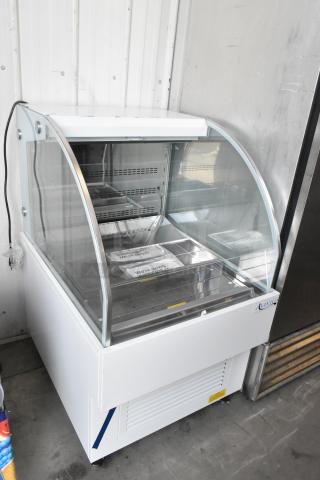 Brand new Avantco 193HAC28W 28" white horizontal air curtain merchandiser with 1 shelf, LED lighting, minor imperfections.