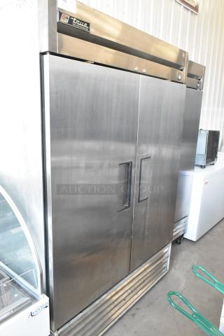 True T-49 stainless steel commercial two-door reach-in cooler, 115 volts, 1 phase, good condition, front view.