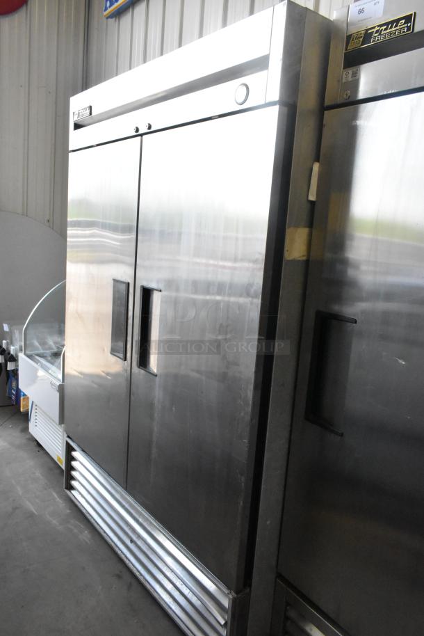 True T-49 Stainless Steel Commercial 2 Door Reach In Cooler, excellent condition. 115 Volts, 1 Phase. Visible True logo.