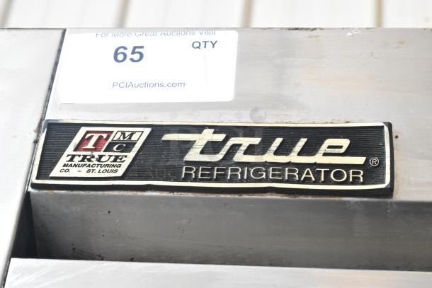 True T-49 stainless steel commercial cooler, 2 doors, 115 volts, 1 phase. True Manufacturing label visible.