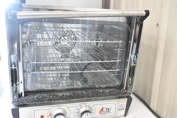 Cooking Performance Group COQ-T3-A stainless steel countertop convection oven. Broken glass panel. Model 351COQT3A, 110V, 1 Phase.