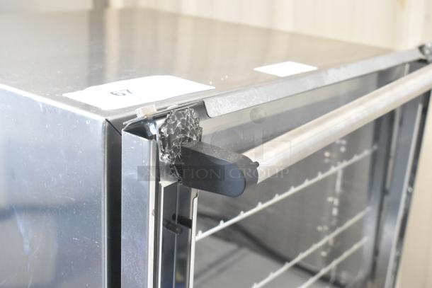 Cooking Performance Group COQ-T3-A convection oven with broken glass door, stainless steel, countertop model, 110V, 1-phase.