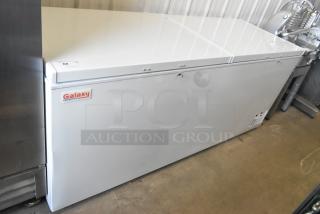Brand new Galaxy 177CF25HC metal chest freezer with two hinge lids; 115 volts, 1 phase; visible scratch and dent.