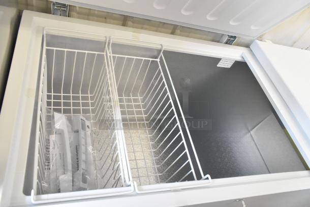 Brand new Galaxy 177CF25HC metal chest freezer, scratch and dent, with 2 hinge lids, 115 volts, 1 phase, includes baskets.