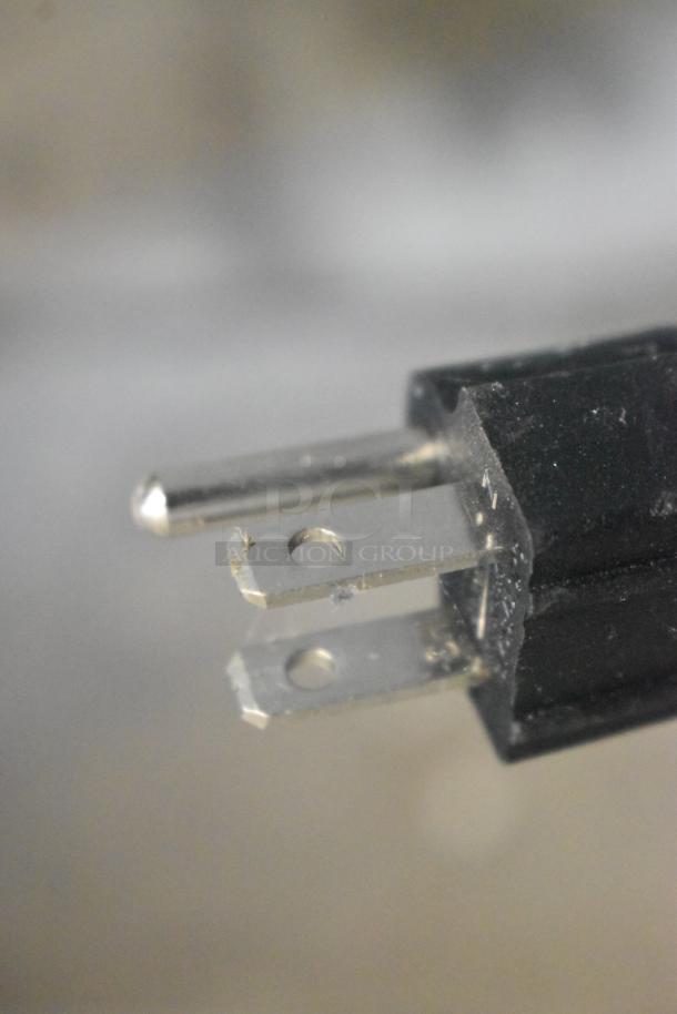 Close-up of a power plug for a Galaxy 177CF25HC Metal Chest Freezer, 115 Volts, 1 Phase.