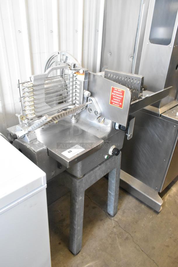 Bizerba 330 metal commercial floor-style meat slicer stacker, 115 volts, 1 phase, in used condition. Visible safety labels.
