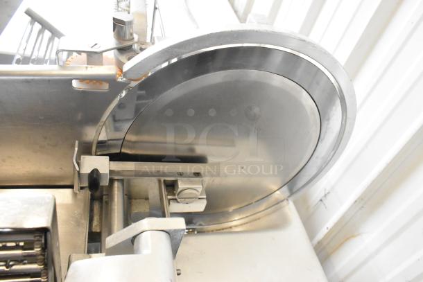 Bizerba 330 metal commercial floor meat slicer stacker, stainless steel, 115 volts, 1 phase, in good condition.