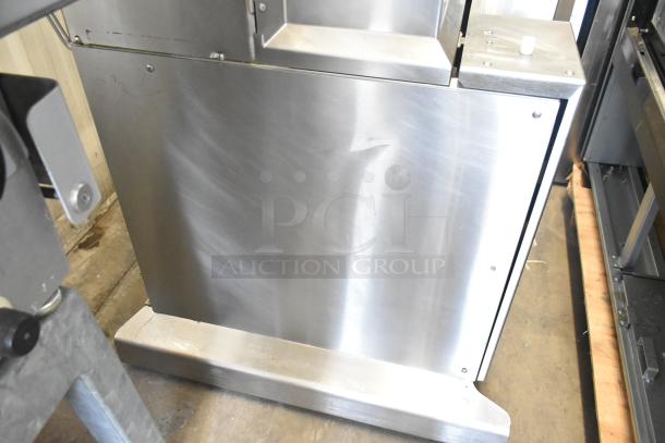 Stainless steel Fresh N Squeeze POS-1 citrus juicer, commercial floor style, on casters, 115V, 1 phase, good condition.