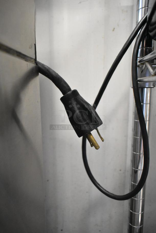 Fresh N Squeeze POS-1 citrus juicer plug. Commercial-grade, stainless steel, on casters. 115V, 1 phase.