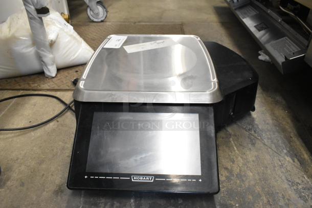 Hobart HTi commercial food portioning scale, countertop model, stainless steel platform, touch display, 120/208-240V, 1 Phase.