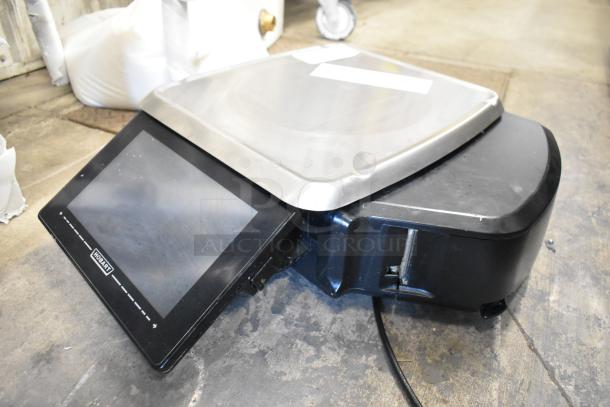 Hobart HTi commercial food portioning scale with touchscreen, stainless steel platform. 120/208-240V, 1 phase, used condition.