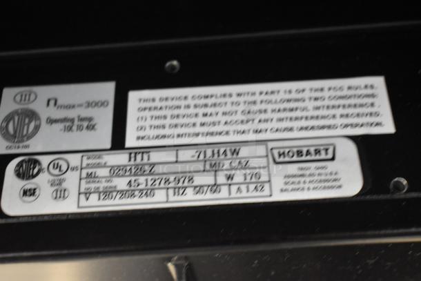 2023 Hobart HTi Metal Commercial Countertop Food Portioning Scale, 120/208-240V, 1 Phase. Model and specifications visible.
