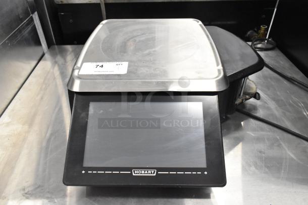 2016 Hobart HTi metal commercial countertop food portioning scale, 120/208-240V, touchscreen, stainless steel platform.