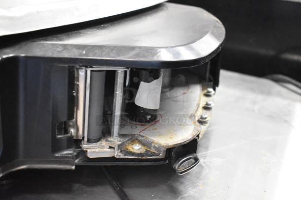 2016 Hobart HTi metal commercial countertop food scale, showing close-up of internal mechanism, in used condition.