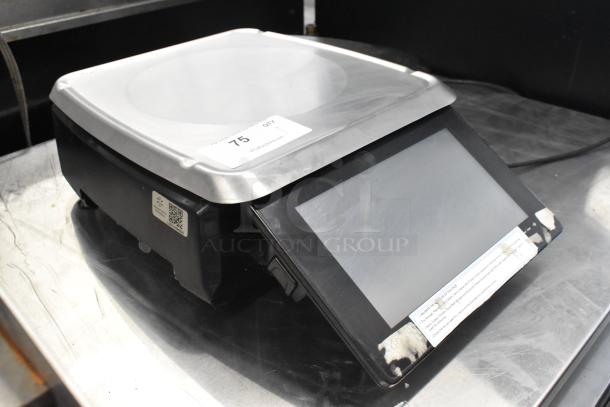 2016 Hobart HTi metal commercial countertop food portioning scale. Features digital display, 120/208-240V, 1 Phase. Good condition.