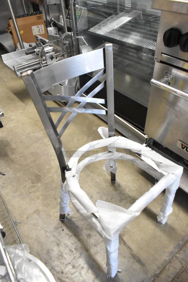 Gray metal dining height cross back chair frame, brand new, visible packaging, scratch and dent condition.