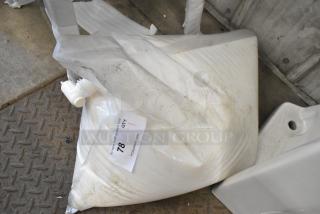 Bag of hand soap, slightly soiled, with a visible label reading "78 QTY 1" from PCAuctions.com.