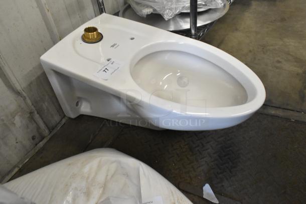 American Standard toilet bowl, white porcelain, no tank, brand logo visible, good condition, auction tag present.