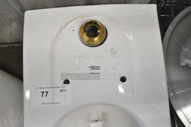 American Standard toilet bowl, no tank, features EverClean surface, new condition, visible PCI Auctions tag with number 77.