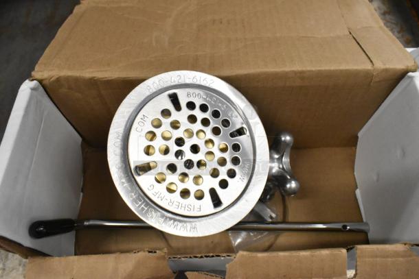 Brand new Fisher 22365 metal drain with minor scratches and dents. Includes manufacturer contact details engraved on the top.