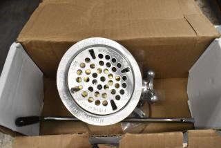 Brand new Fisher 22365 metal drain with minor scratches and dents. Includes manufacturer contact details engraved on the top.