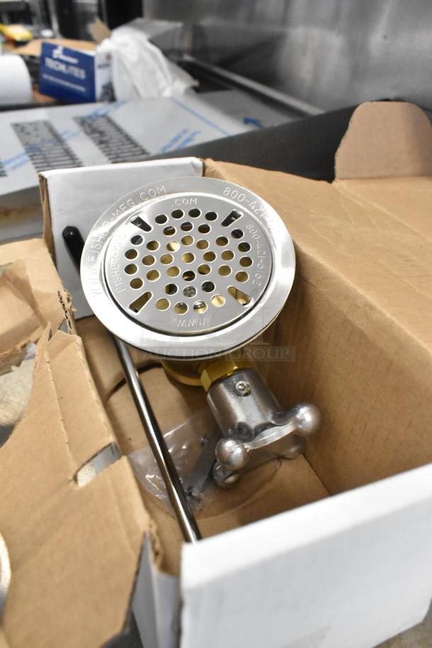 BRAND NEW Fisher 22365 Metal Drain with minor scratches and dents, visible engraved branding and contact details.