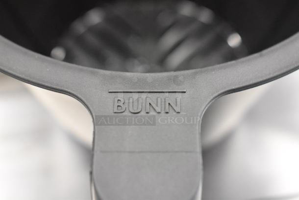 Bunn poly brew basket, black plastic, brand logo visible, part of a set of 4, good condition.