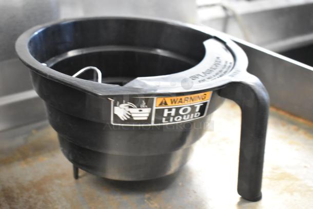 Black poly brew basket with handle, "Warning Hot Liquid" label, sturdy design, includes four baskets per auction bid.