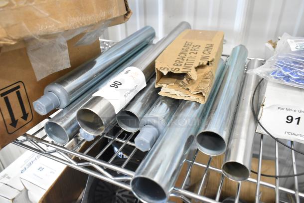Lot of 10 metal legs, chrome finish, new condition with ends for attachment, includes packaging with labeling.