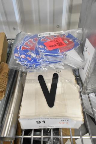 Choice XKD525U078 Fish Deli Tag Wheel pack and sign letters on a shelf. Includes 25 tags in blue and red.