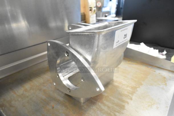 Stainless steel metal grater attachment in good condition, featuring a flange with mounting holes and a visible label marked "92".
