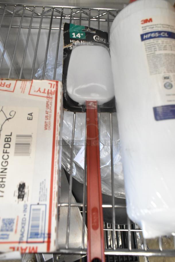 4 items including Avantco filter drier, 1/4" sweat fitting, hinge pivot, 3M cartridge, Choice spatula in original packaging.